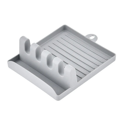CleanCook™ – A holder that keeps your countertop clean while you cook