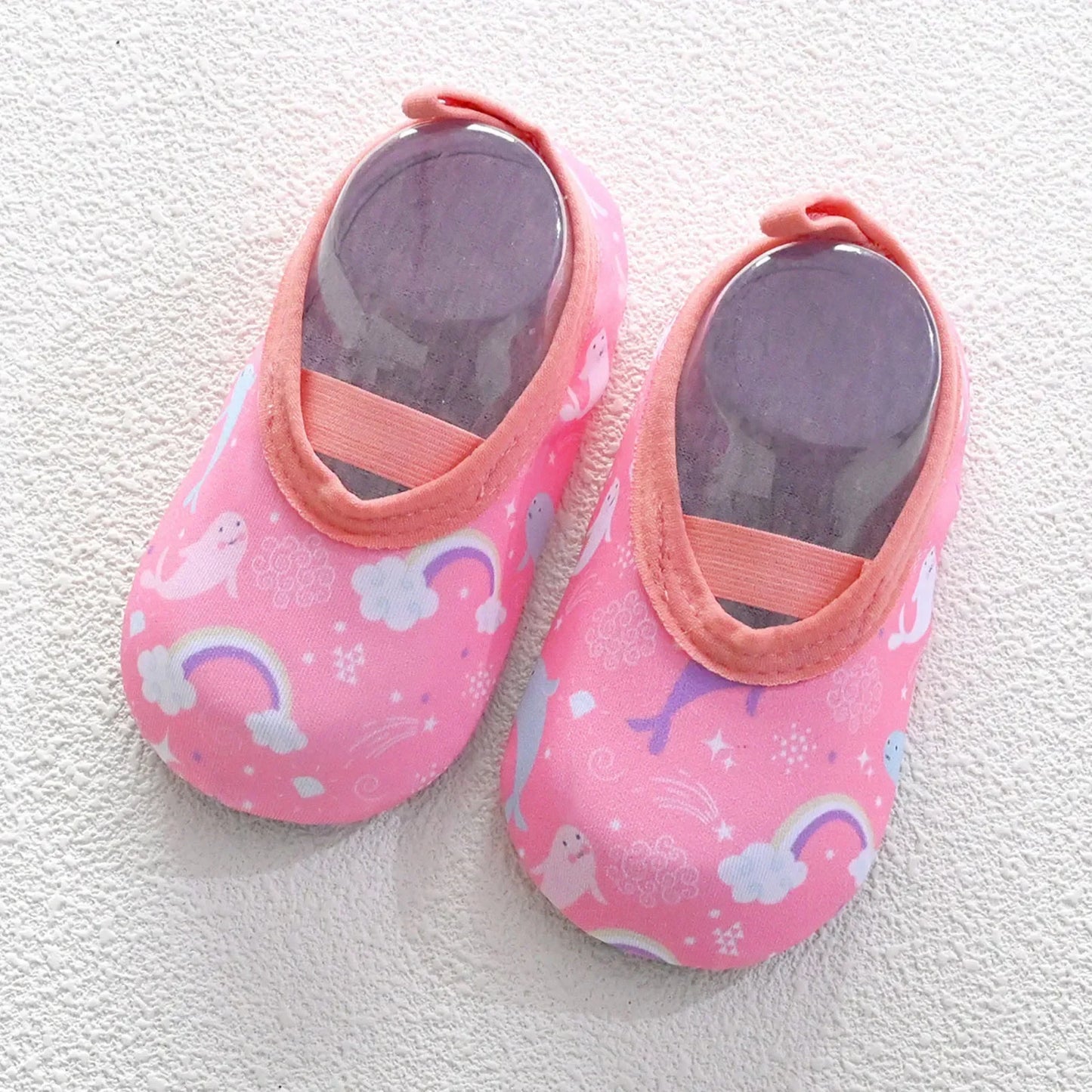 AquaPaws™ – Lightweight shoes that protect and give freedom to play in the water.