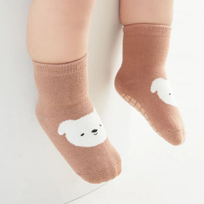 TinyPaws™ – Non-slip socks that keep little feet safe and comfortable.