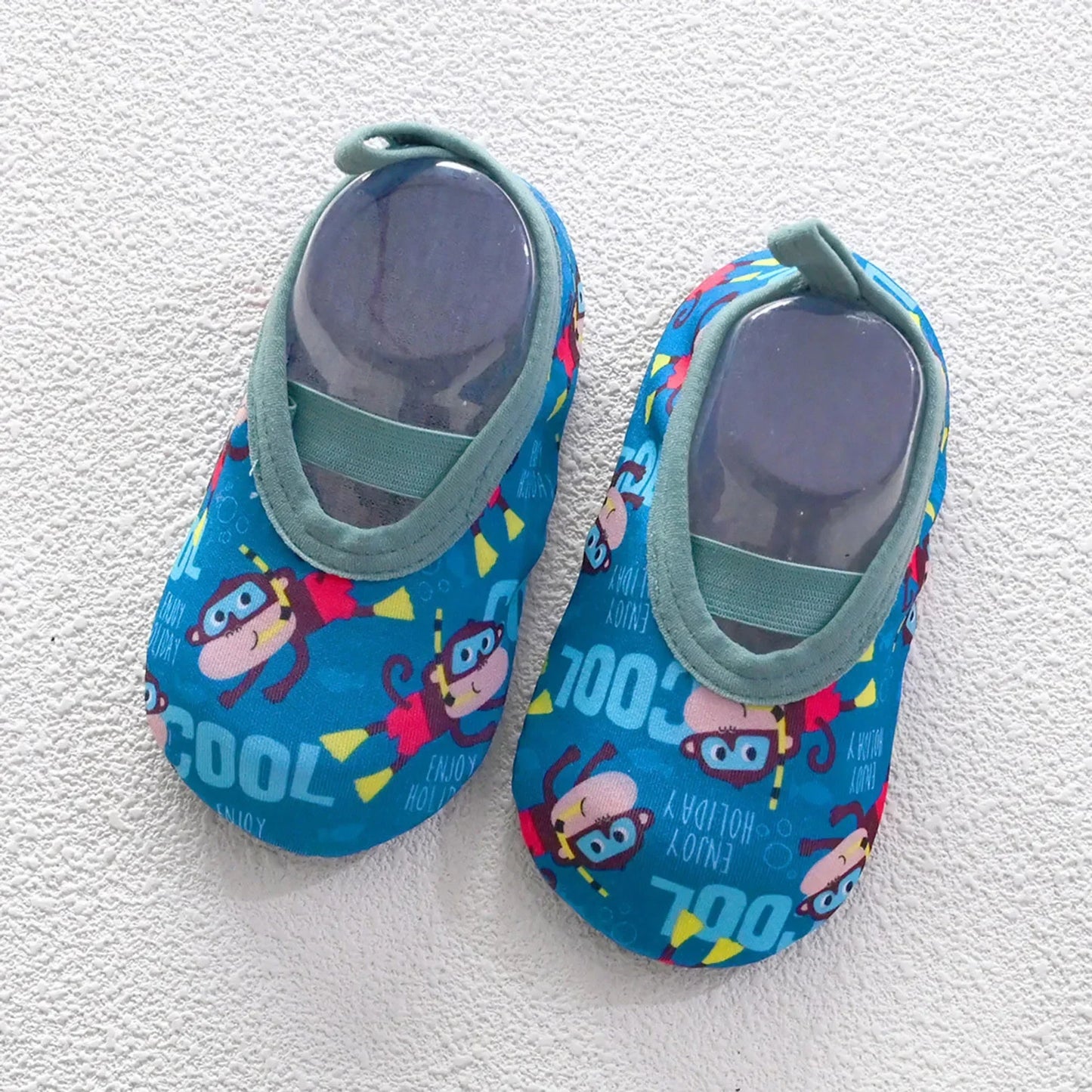 AquaPaws™ – Lightweight shoes that protect and give freedom to play in the water.