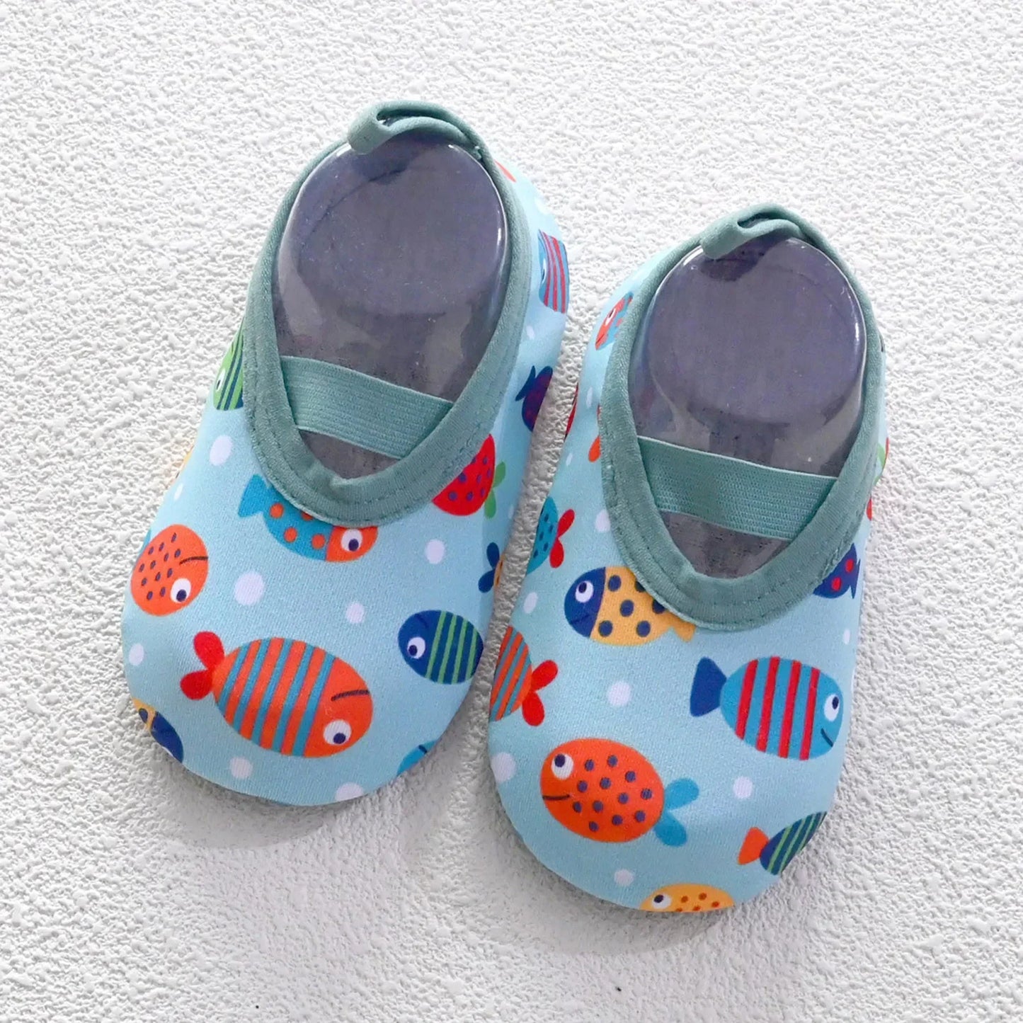 AquaPaws™ – Lightweight shoes that protect and give freedom to play in the water.
