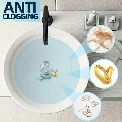 PopDrain™ – Un desagüe inteligente con sistema push-click fácil y filtro anti-obstrucción.