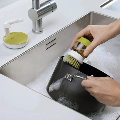 SoapScrub™ – A brush with a built-in dispenser that makes cleaning easy in one press